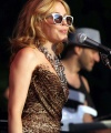 10113_celebrity_paradise_com_Kylie_Minogue_Watermill_18_122_176lo.jpg